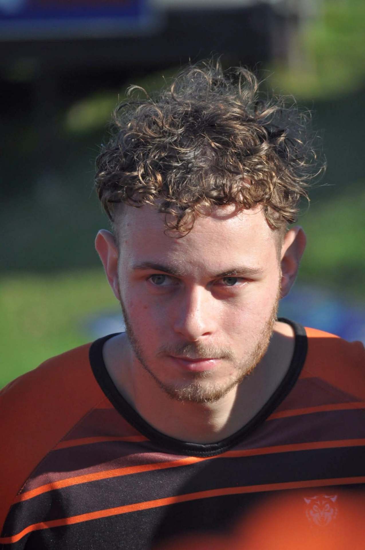 Close-up portrait of an Olutsha Wolves player in the club jersey