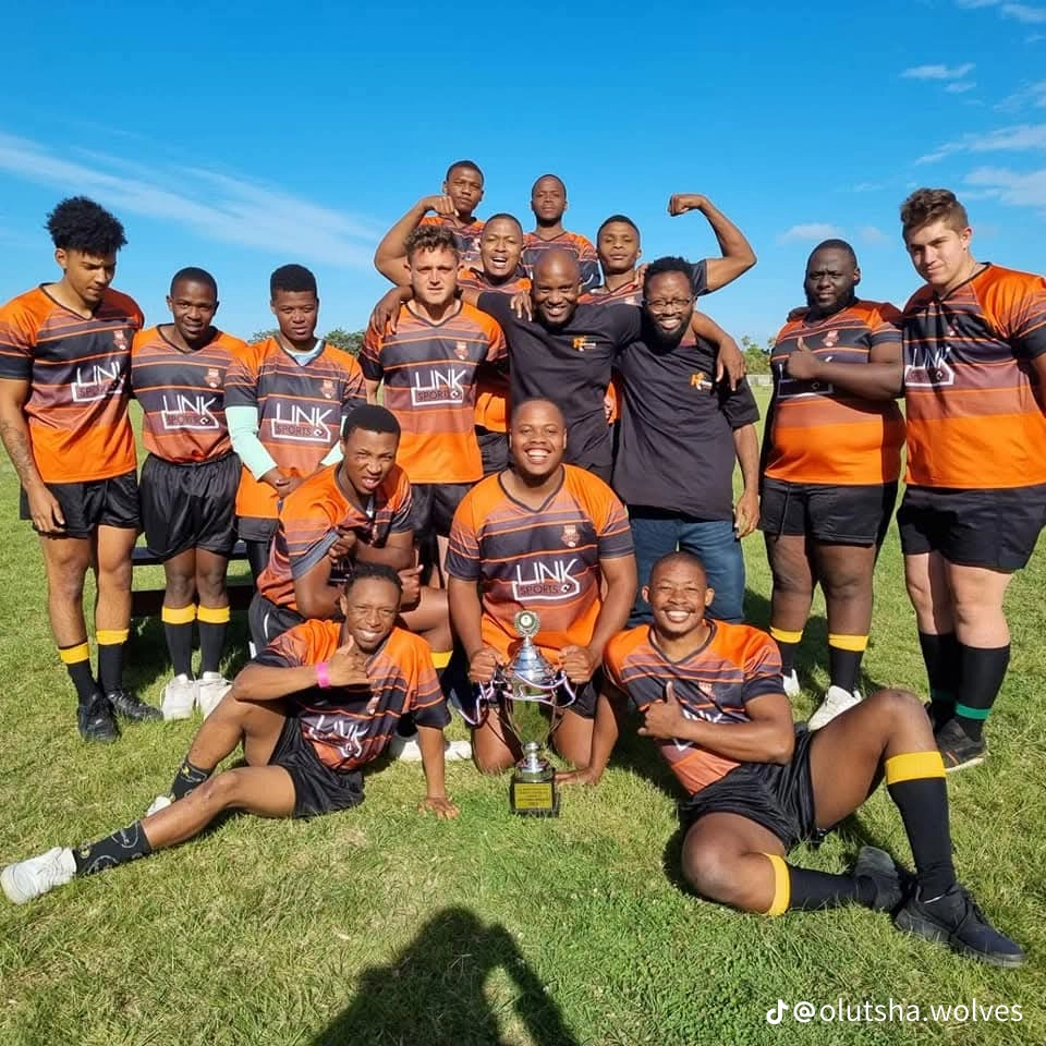 Olutsha Wolves 2021 squad with the championship trophy