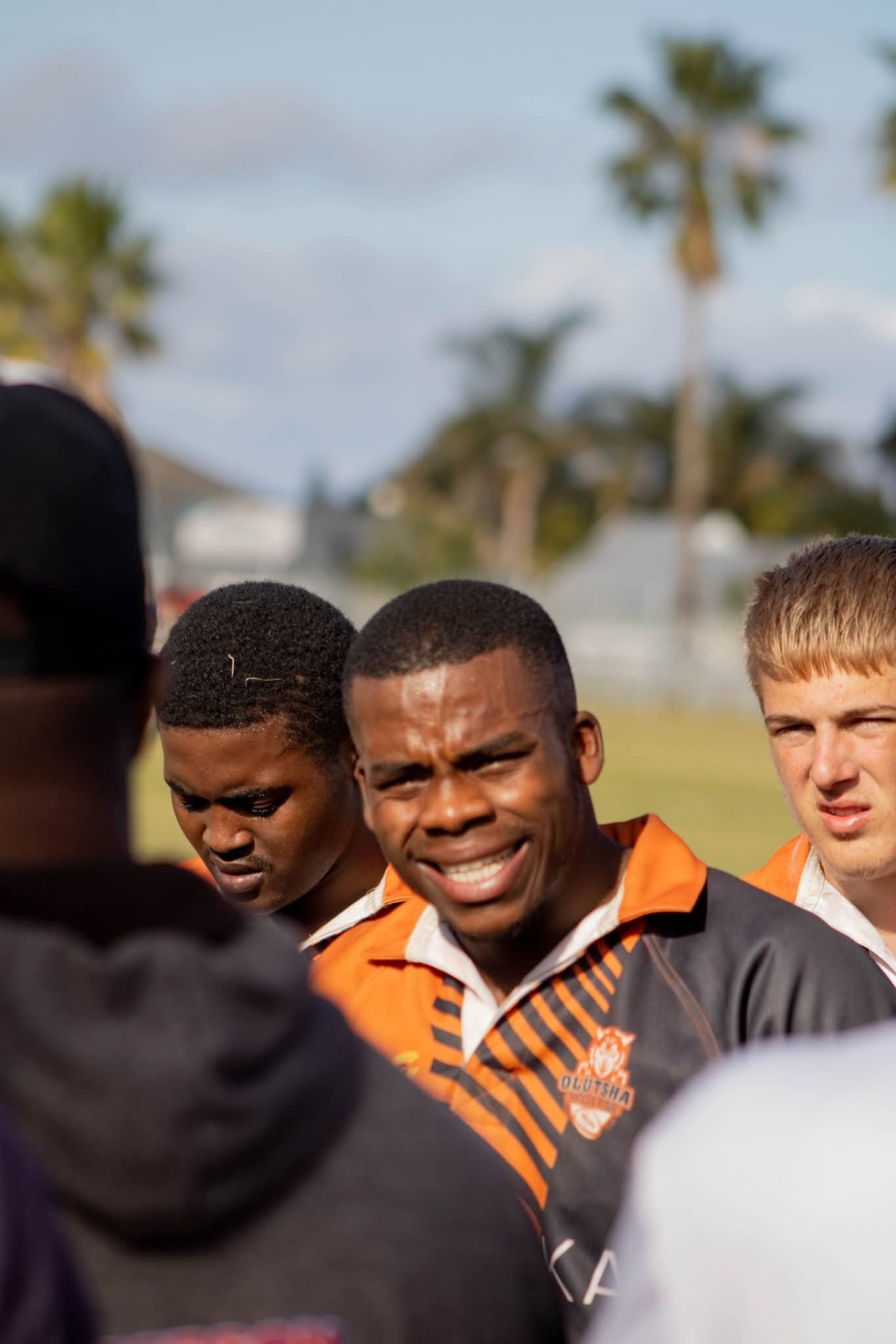 Olutsha Wolves Under-21 players in a team huddle